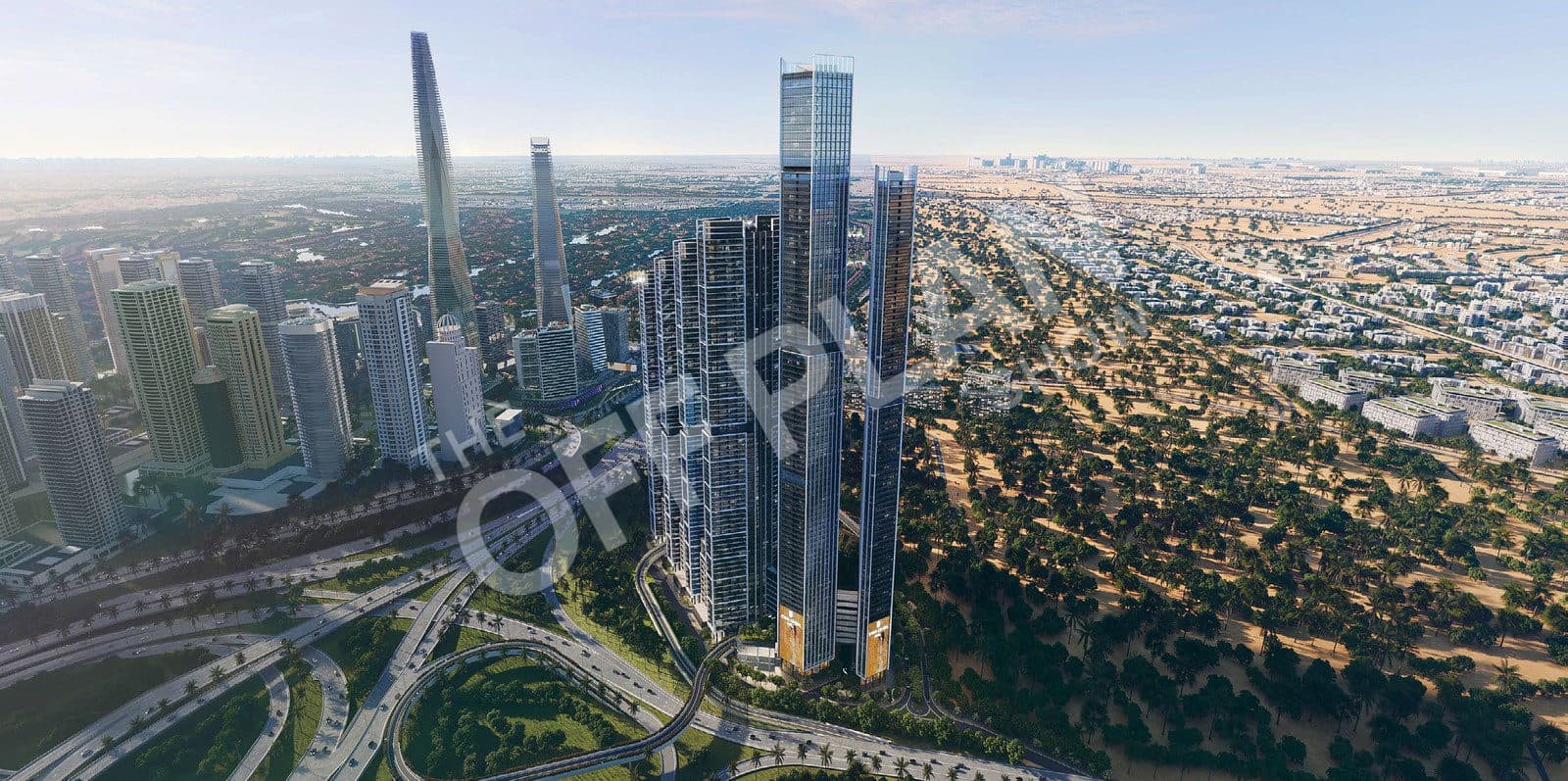 Aerial view of the Sobha Central towers beside the Sheikh Zayed Road interchange with JLT behind