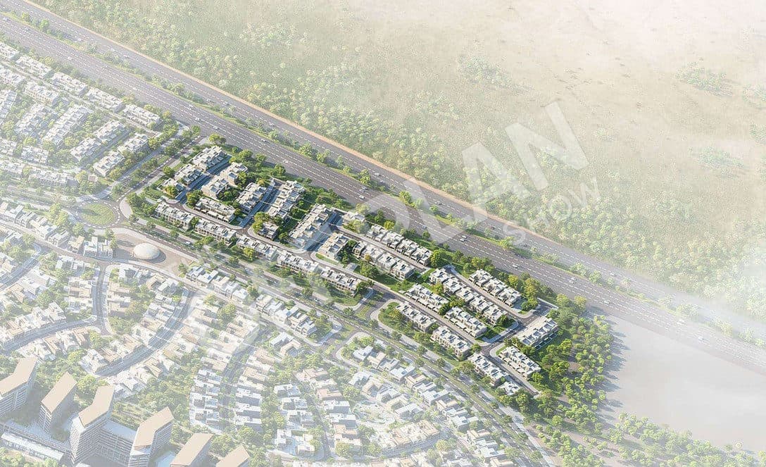 Aerial render with The Brooks shown in full colour as a strip of villas beside the main road